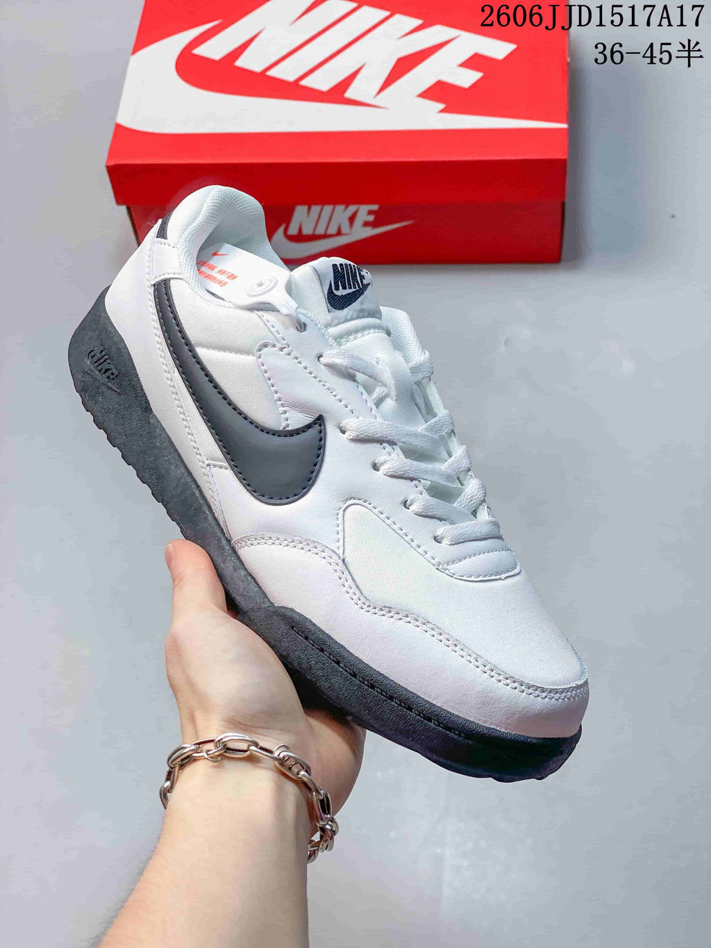 White Nike Terra Manta sneaker with a gray Swoosh and dark outsole