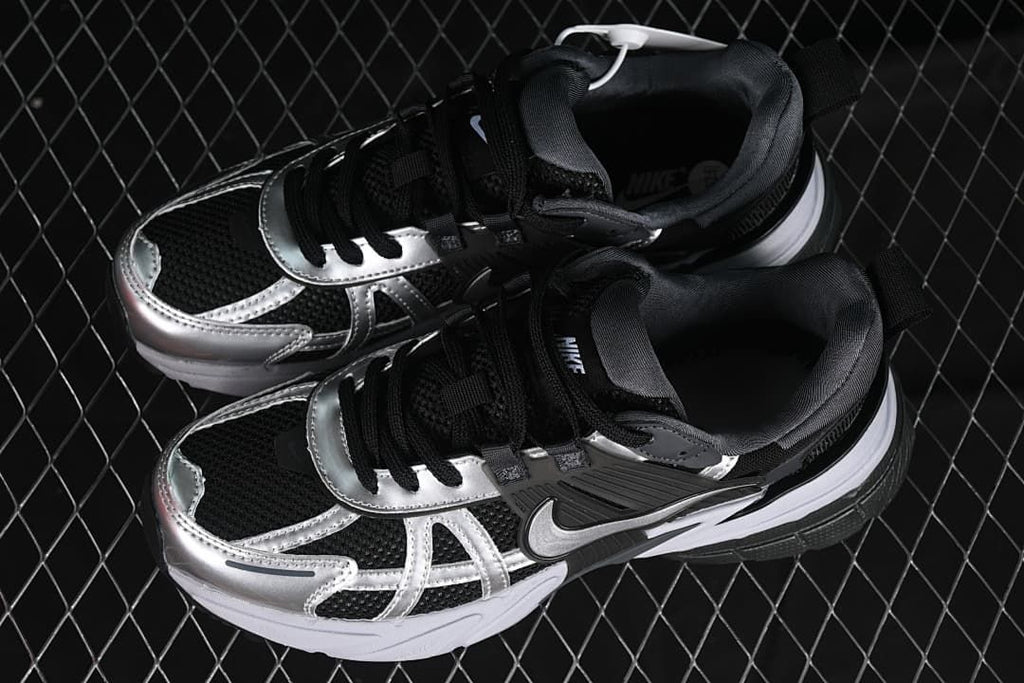 Pair of black and silver Nike V2K Run sneakers viewed from above