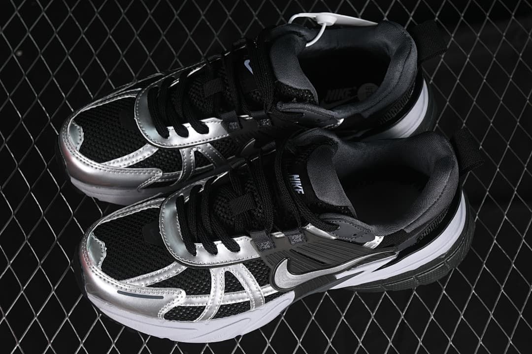 Pair of black and silver Nike V2K Run sneakers viewed from above