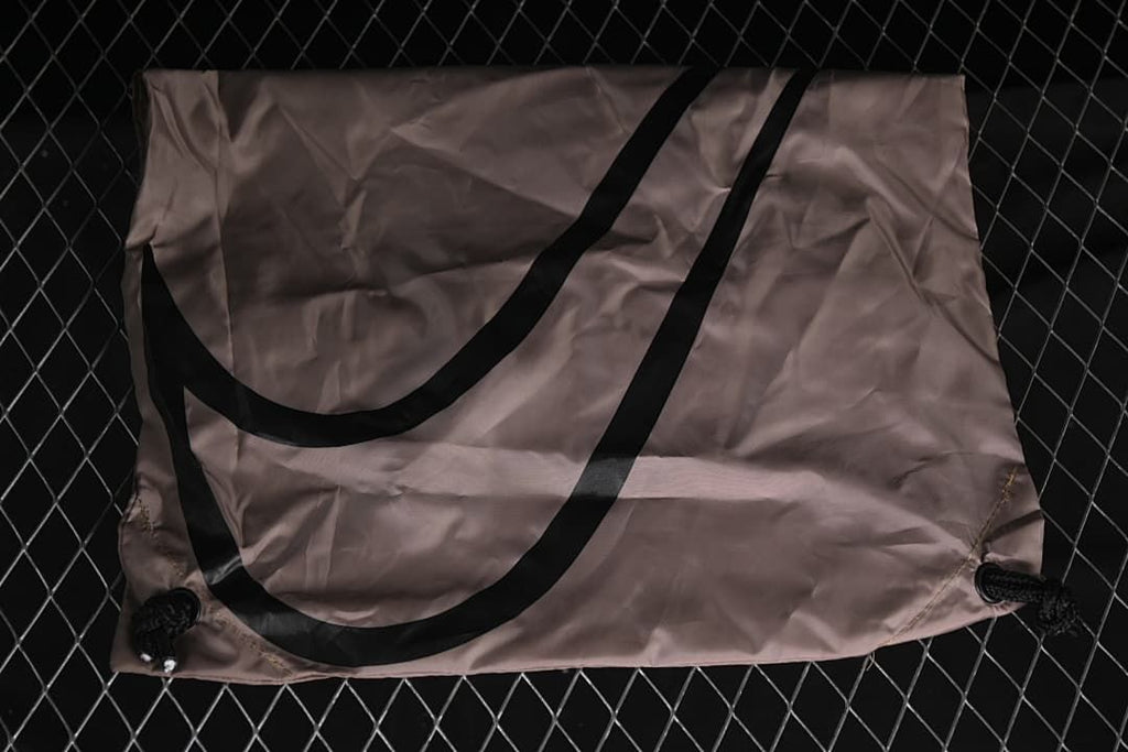 Drawstring shoe bag displayed against a dark background