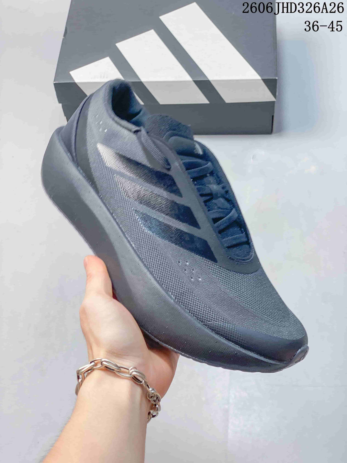 Dark gray adidas Supernova Rise 3 shoe shown from the side