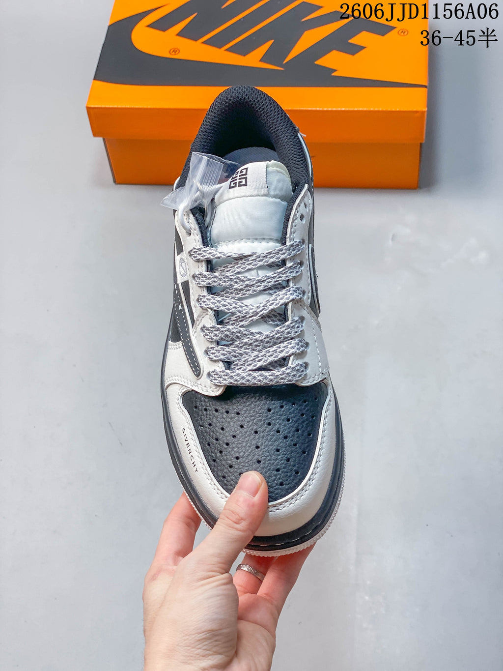 Top view showing the perforated toe, patterned laces, and gray and white panels