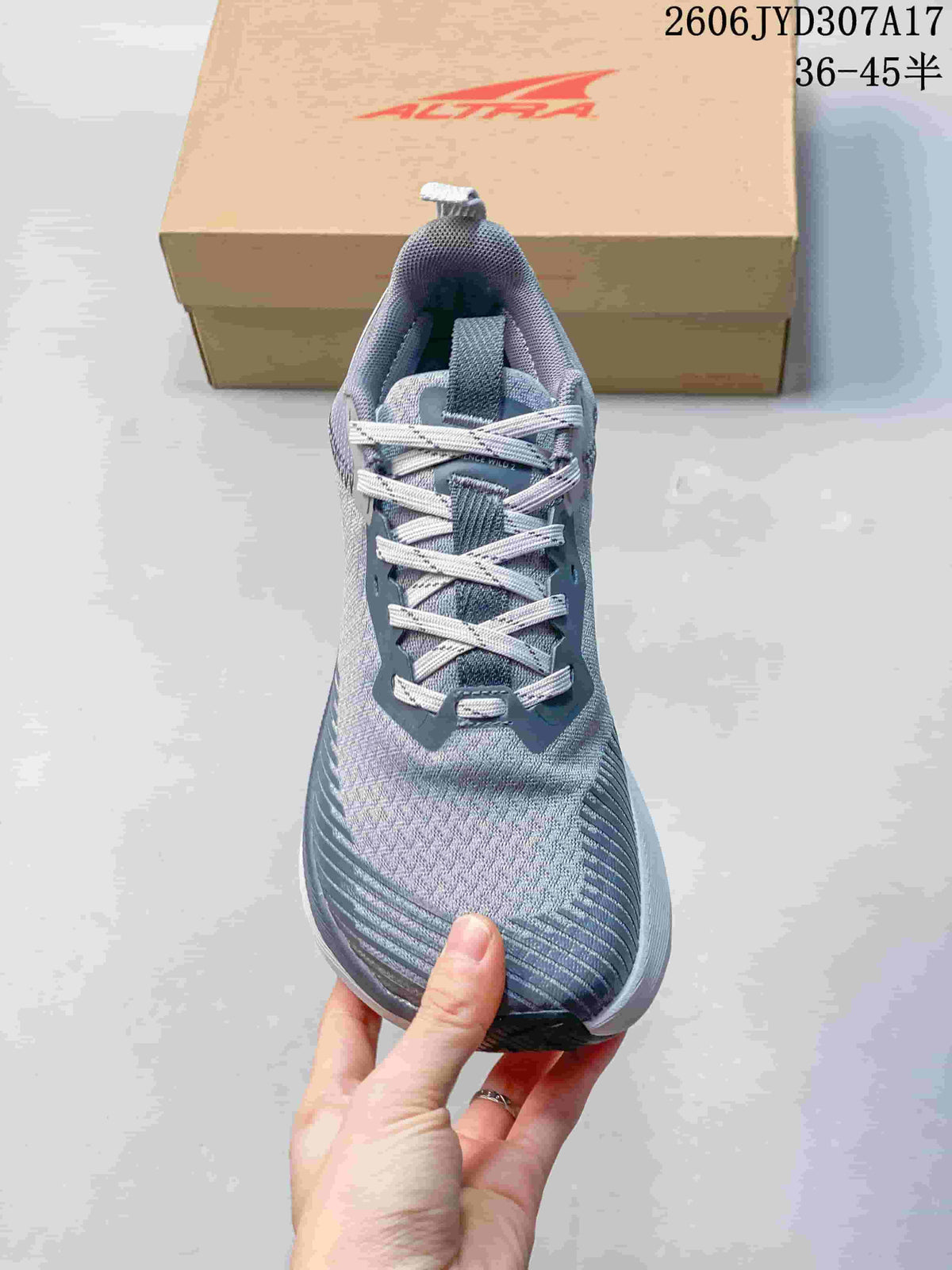 Front view of the gray lace-up running shoe
