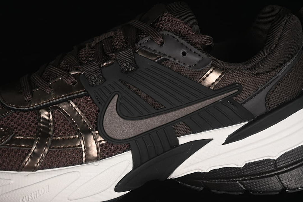 Close-up of the side Swoosh, overlays, and mesh-look panels
