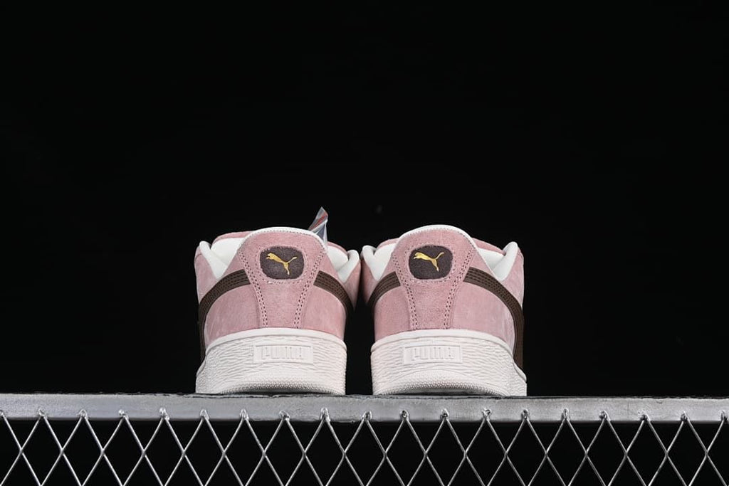 Rear view of the pair showing heel details and white soles.
