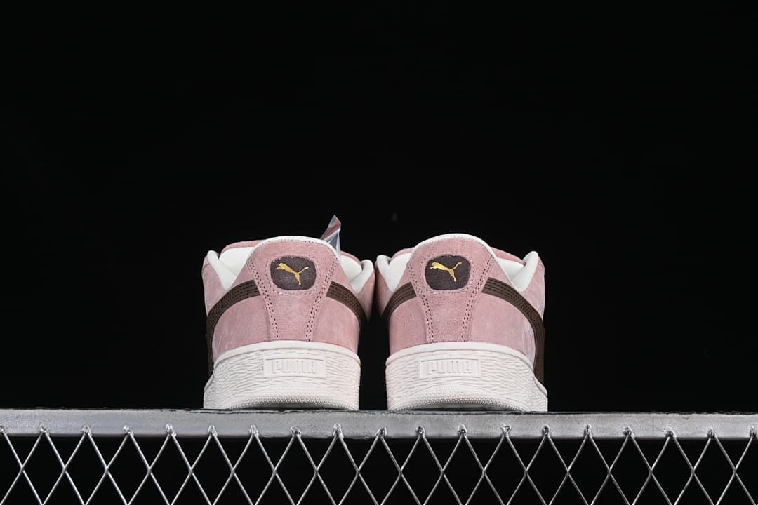Rear view of the pair showing heel details and white soles.