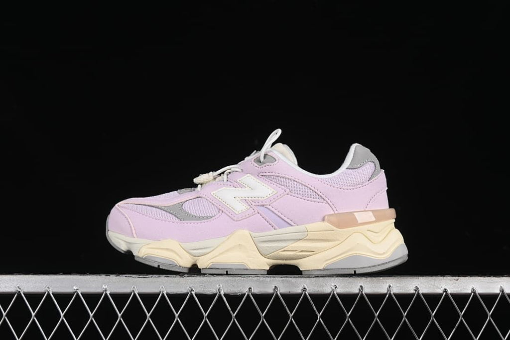 Side view of lavender, grey, and cream New Balance kids sneakers