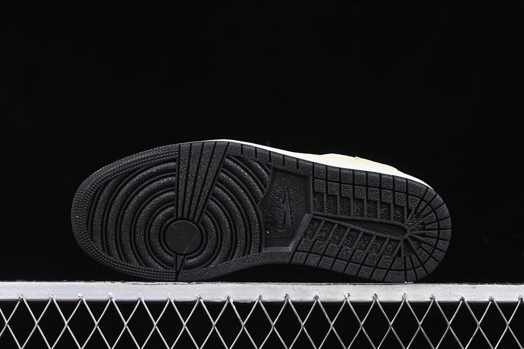 Underside view of the black patterned outsole