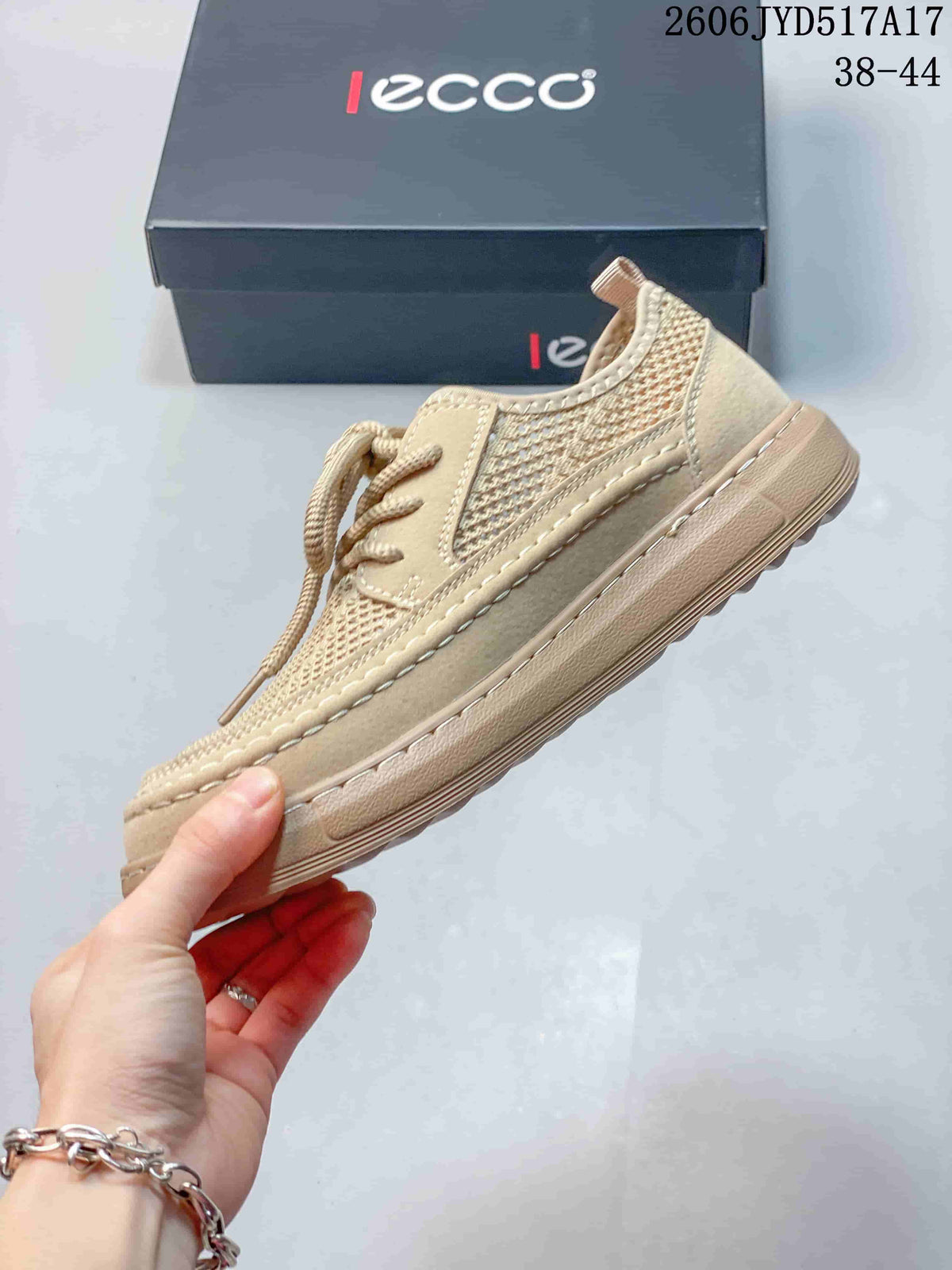 Side view of a beige mesh lace-up shoe with stitched overlays
