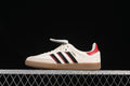 Side view of an off-white adidas Samba LT with black and red stripes, red heel detail, and gum-colored outsole.