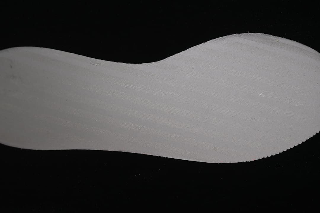 Close-up view of a light-colored shoe insert