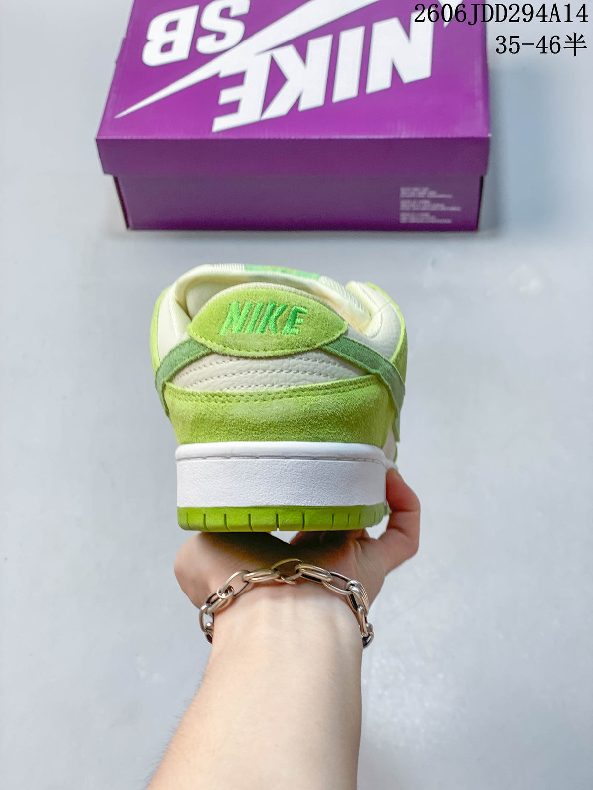 Rear view showing the green heel panel and white midsole