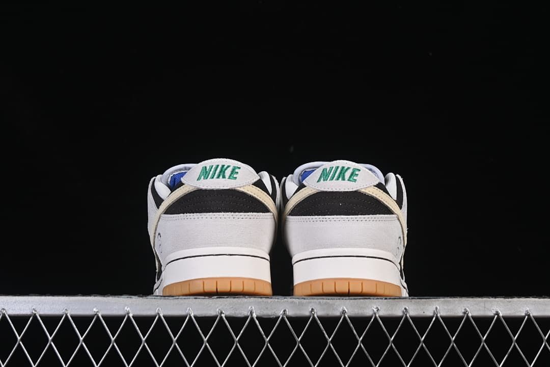Rear view of the pair showing the heel labels and gum outsole.