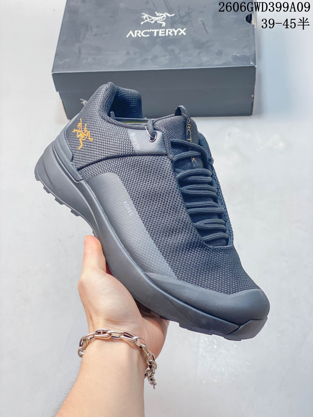 Side view showing the textured upper and logo details