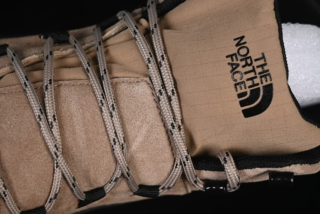 Close-up of the branded tongue, laces, and textured upper