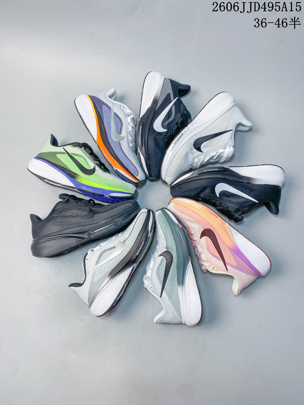 Several Nike Air Zoom Pegasus 42 shoes arranged together in assorted colorways