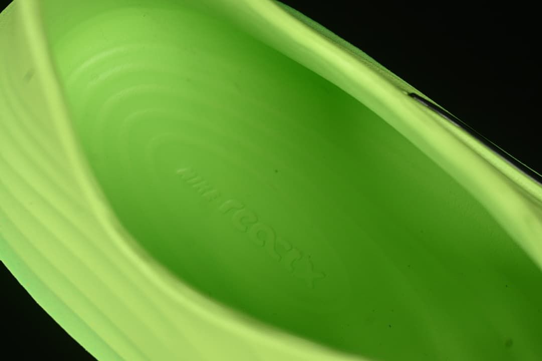 Close-up of the inside footbed of the green clog.