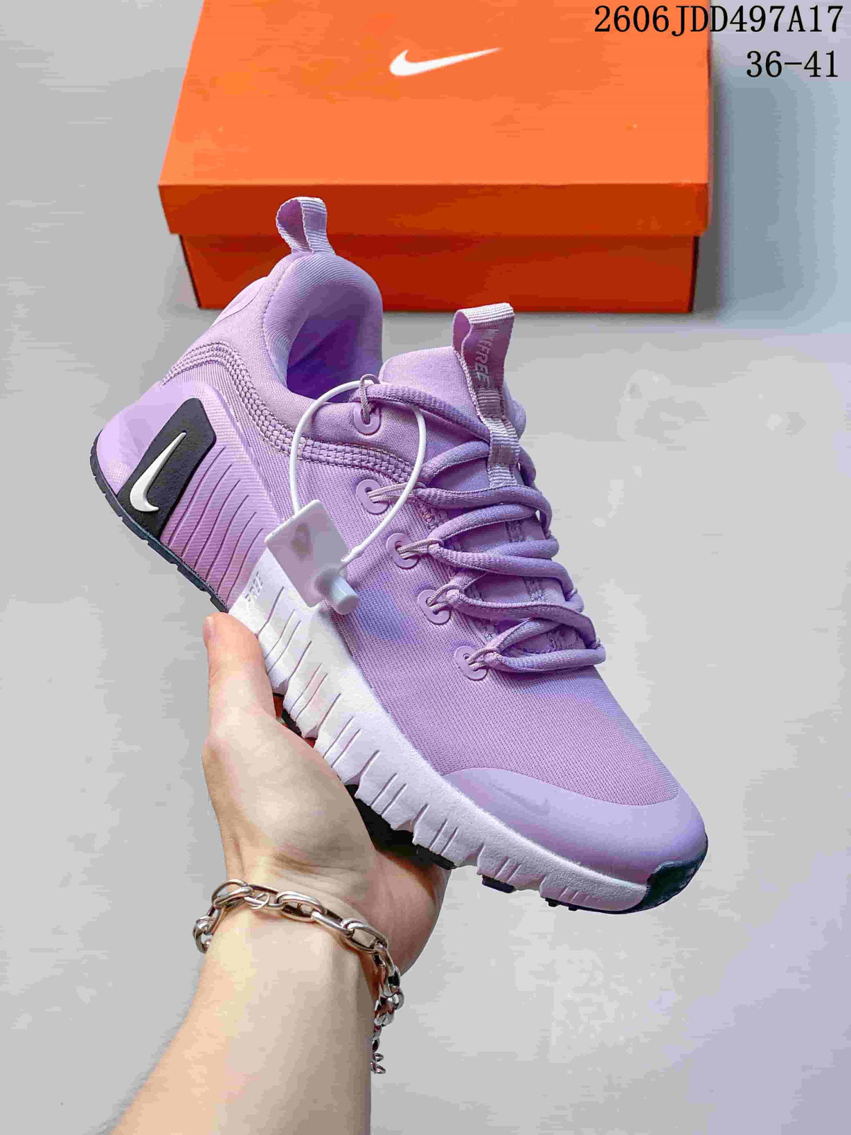 Angled side view of a lavender Nike Free Metcon 7 training shoe