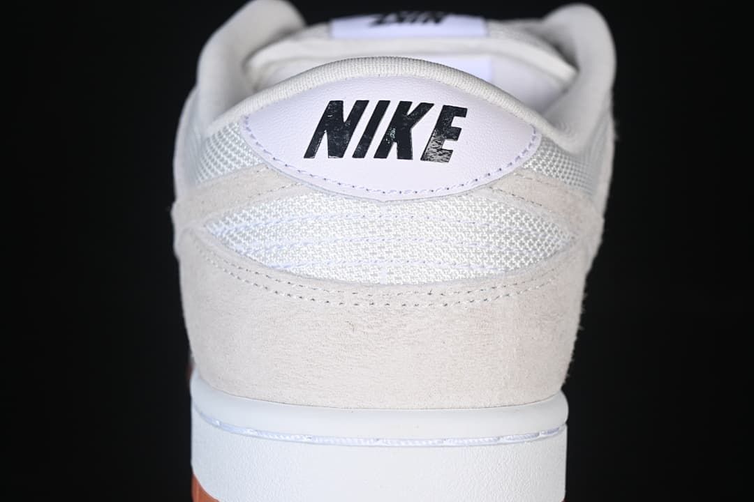 Rear view showing Nike branding and the light-colored heel panels