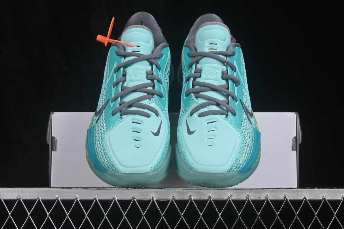 Front view of the pair showing padded tongues, gray laces, toe ventilation details, and contrasting Nike Swooshes.
