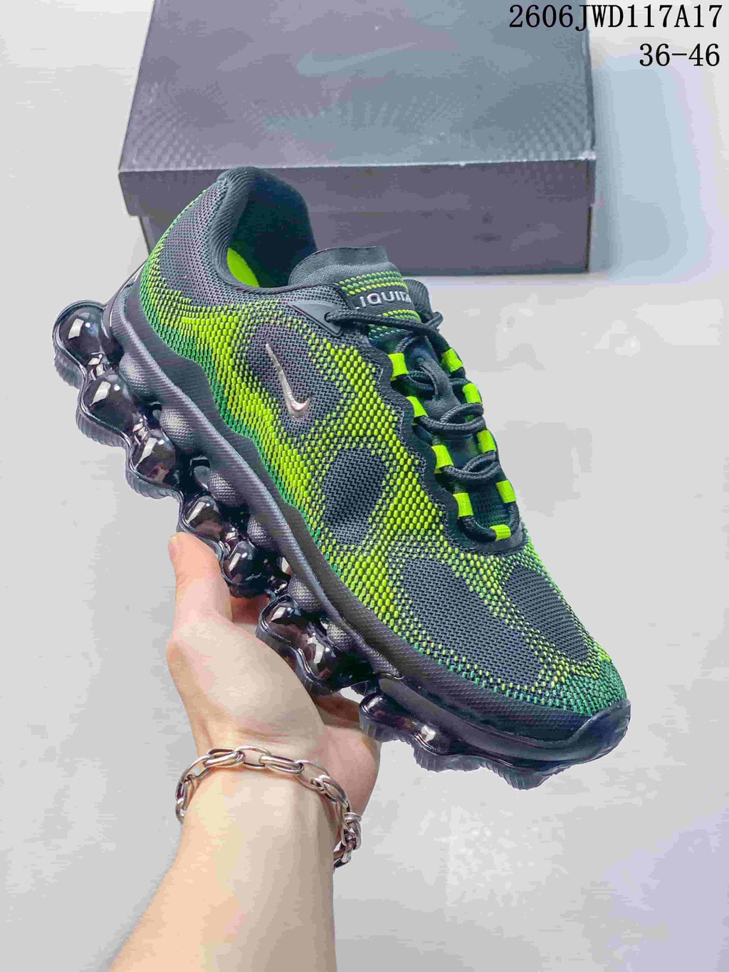 White Nike Air Liquid Max low-top sneaker with a dark side mark