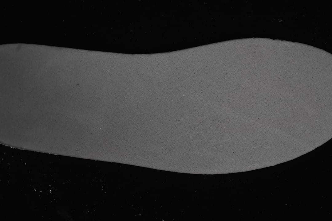 Close-up view of a grey shoe insole.