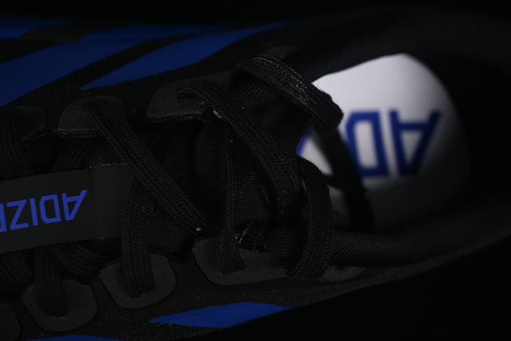 Close-up of the black laces and Adizero insole.