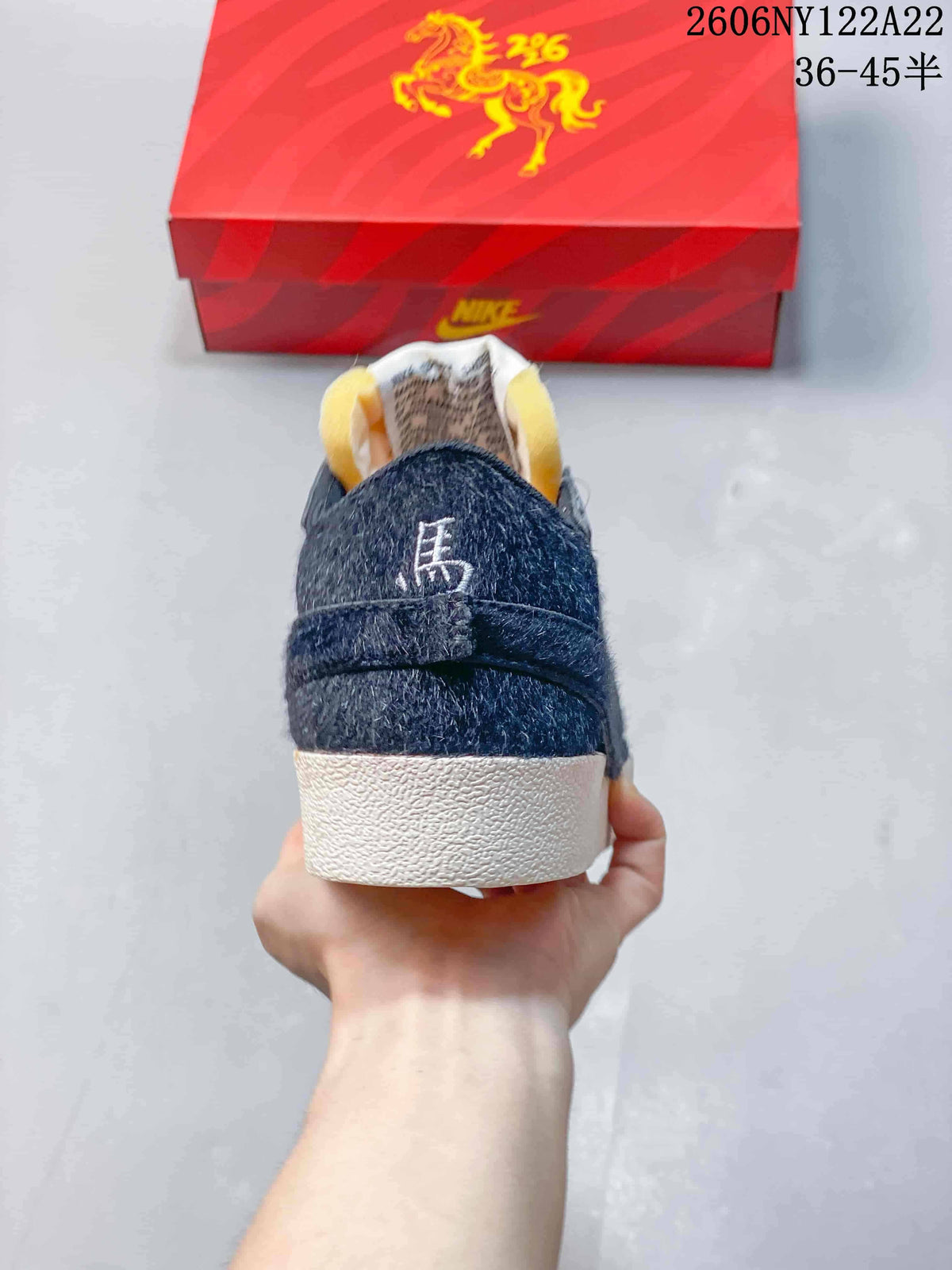 Rear view showing the dark heel overlay and off-white sole