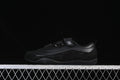 Black Urban Reverie sneaker in side profile against a dark background