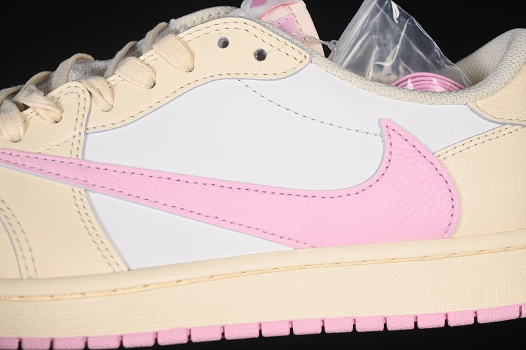 Close-up of the white side panel, pink Swoosh and cream overlays