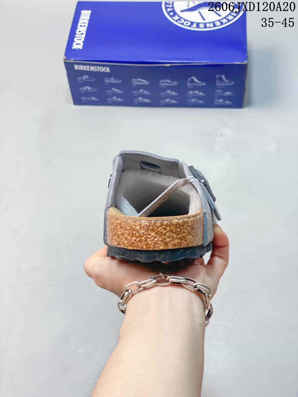 Rear view showing the open heel and cork-look footbed edge