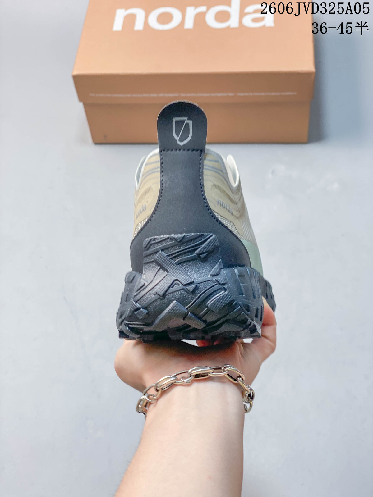 Rear view showing the heel pull tab and rugged outsole.