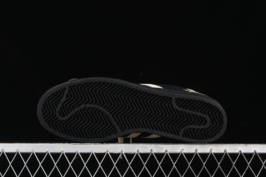 Underside view showing the black outsole tread pattern.