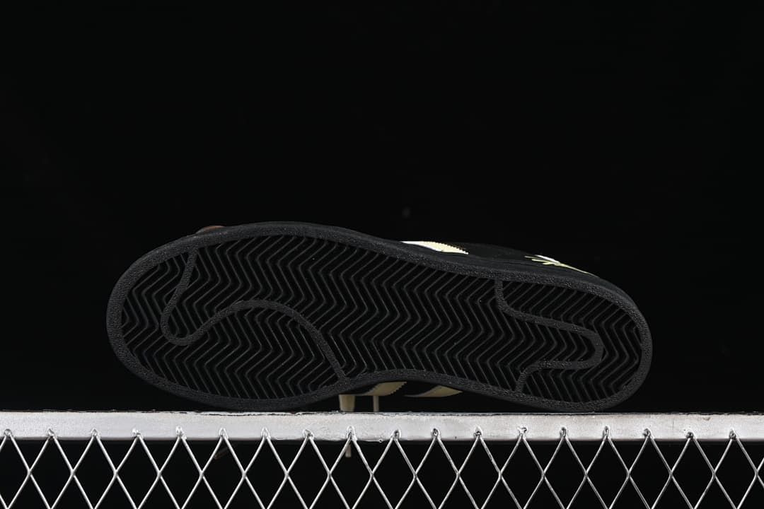 Underside view showing the black outsole tread pattern.
