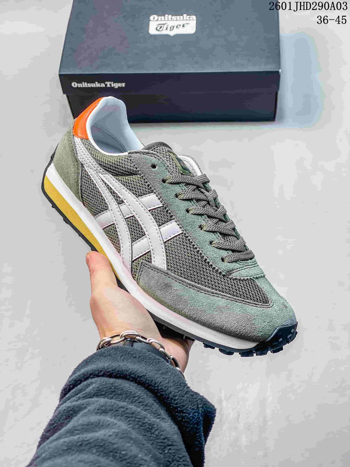 Gray mesh Onitsuka Tiger EDR 78 sneaker with white side stripes and orange heel accent.