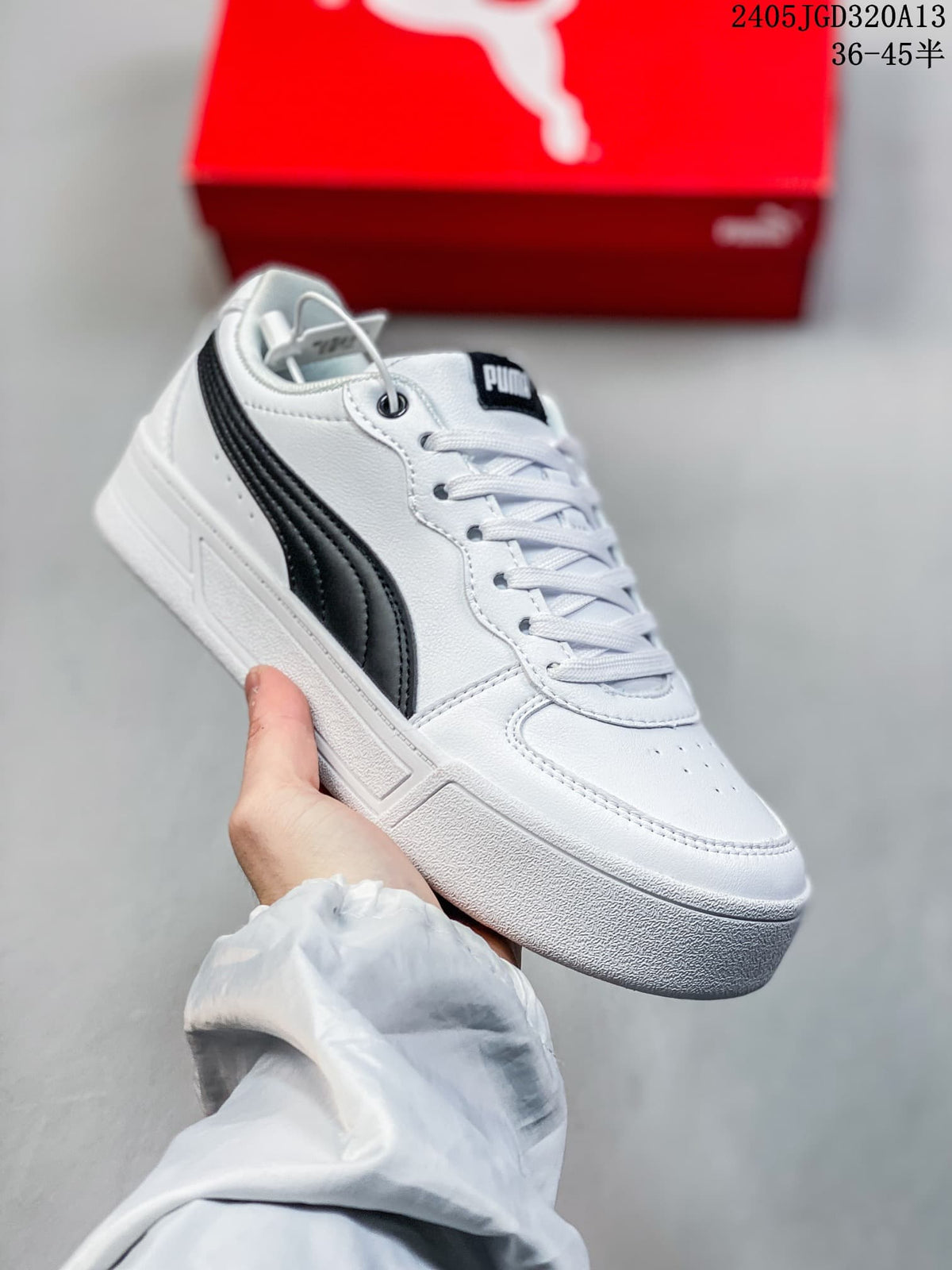 Angled side view of a white low-top sneaker with black side stripes