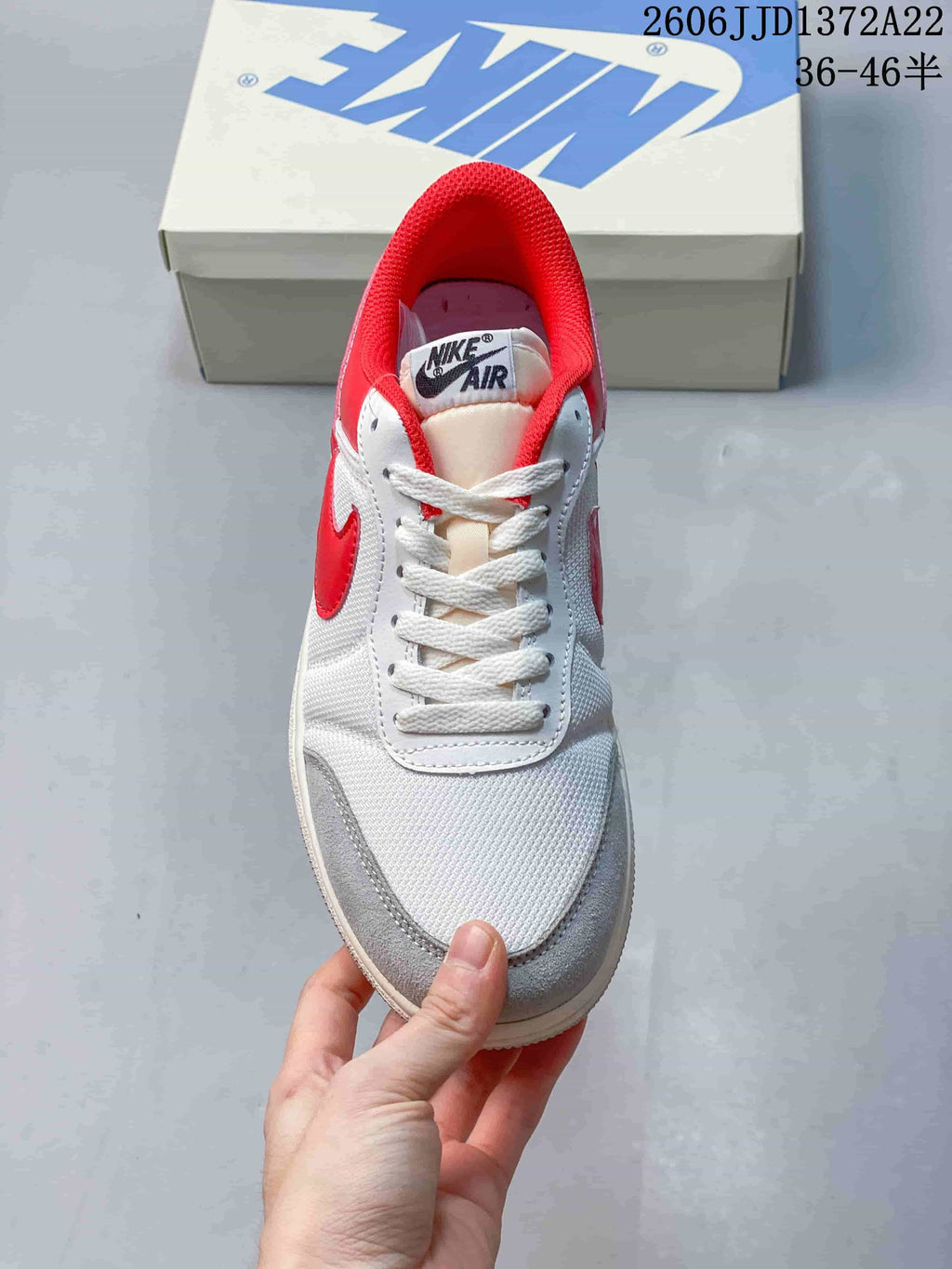 Top view of the lace-up front and white mesh-look upper