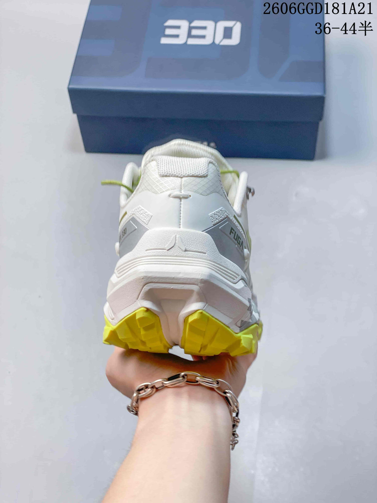 Rear view showing the heel and lugged outsole