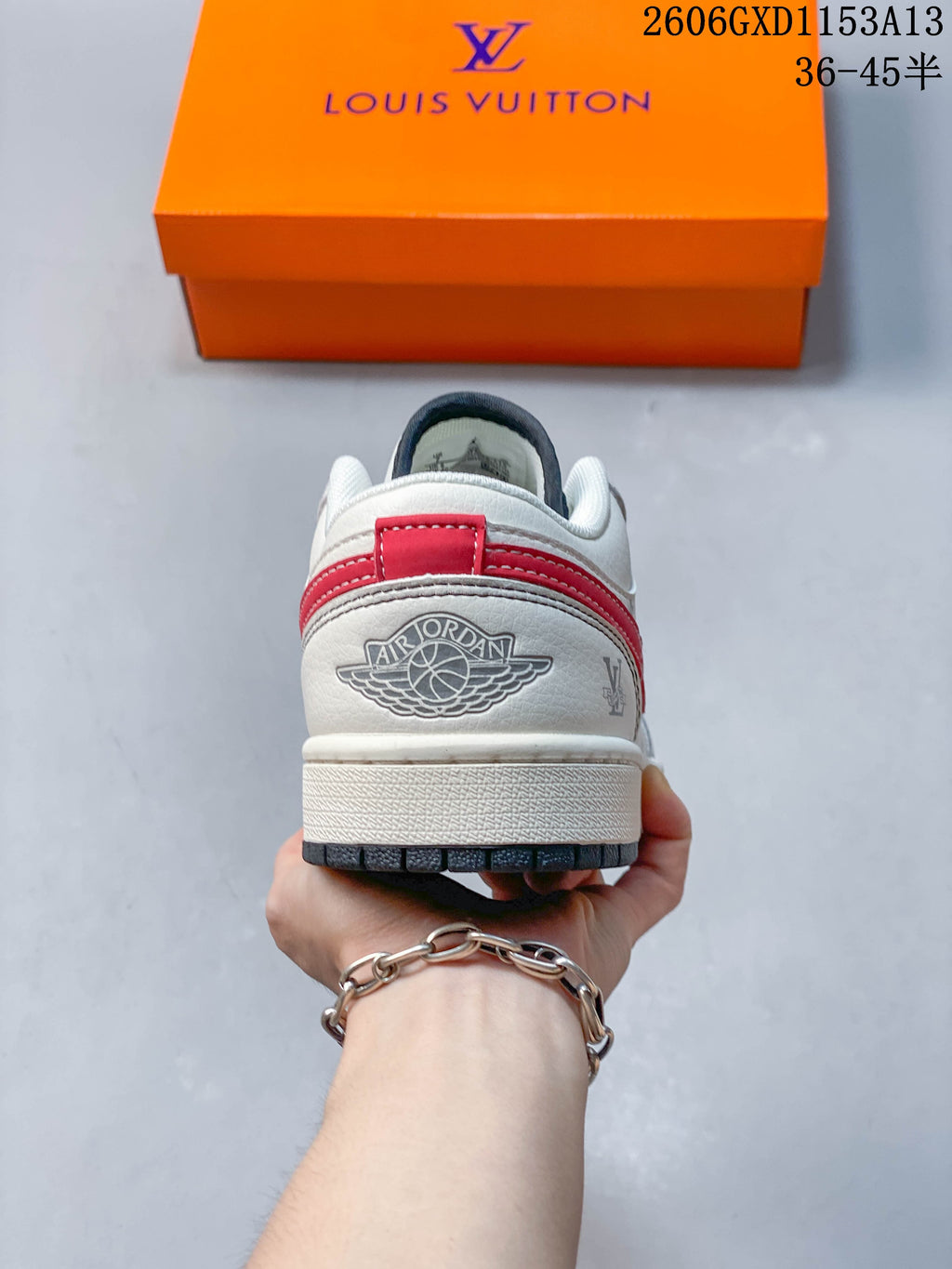 Rear view of the sneaker with a red heel accent and visible Jordan branding
