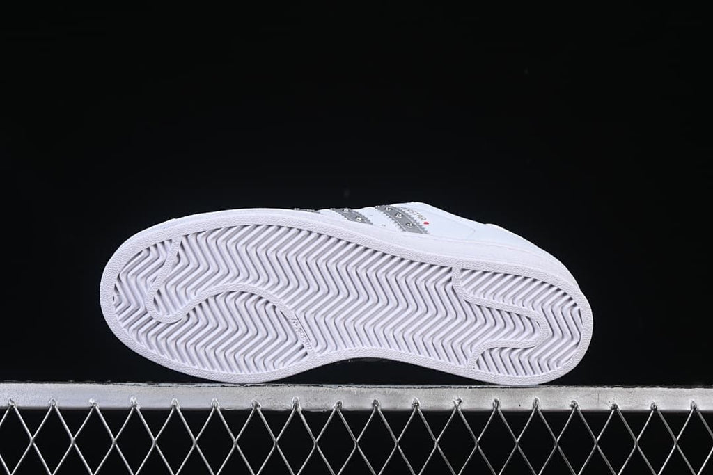 Underside view showing the patterned white outsole