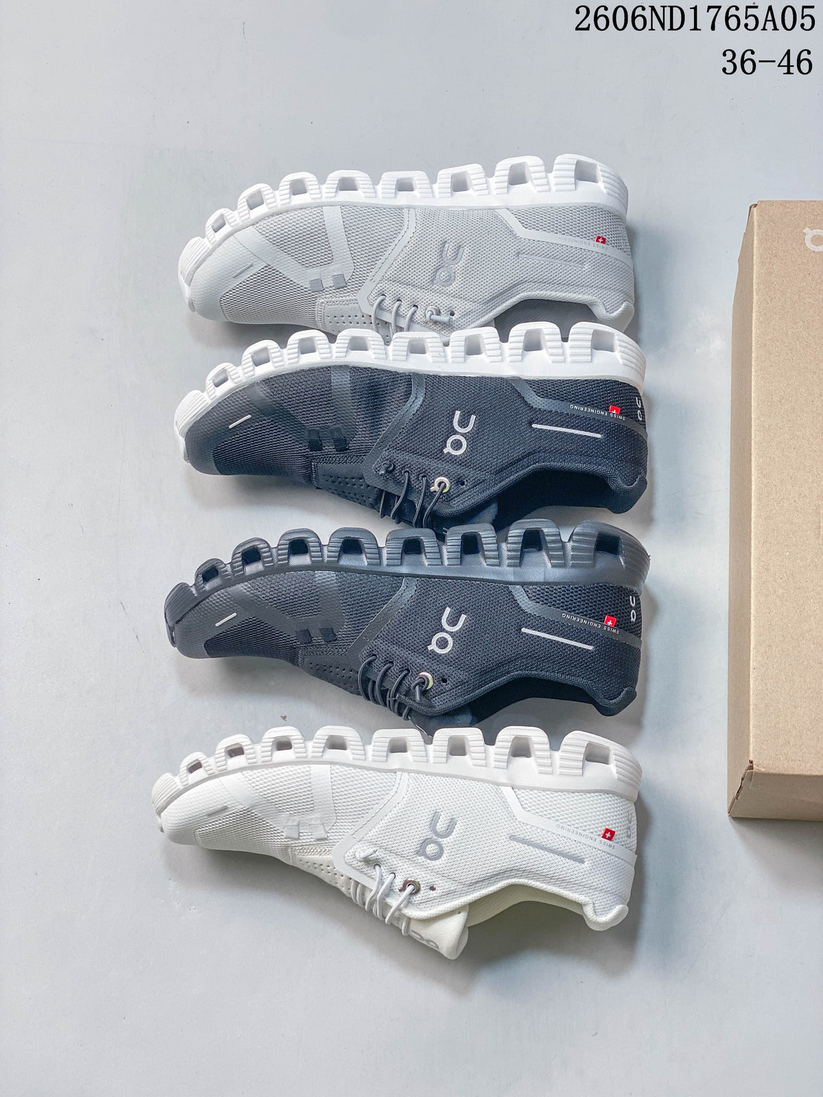 White and gray On Cloud 5 sneakers displayed in side views.