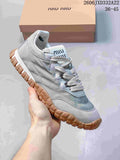 Grey Miu Miu Tyre low-top sneaker with lace-up front and gum-color segmented outsole