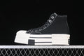 Side profile of a black high-top sneaker with contrast stitching and a thick white sole
