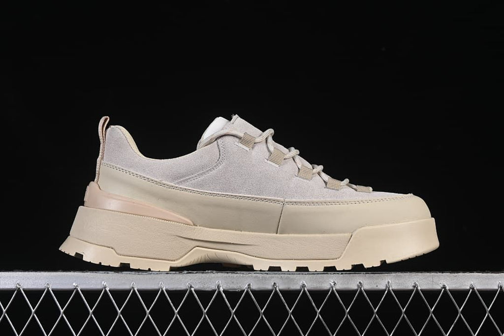 Side profile showing the layered sole and low-top upper
