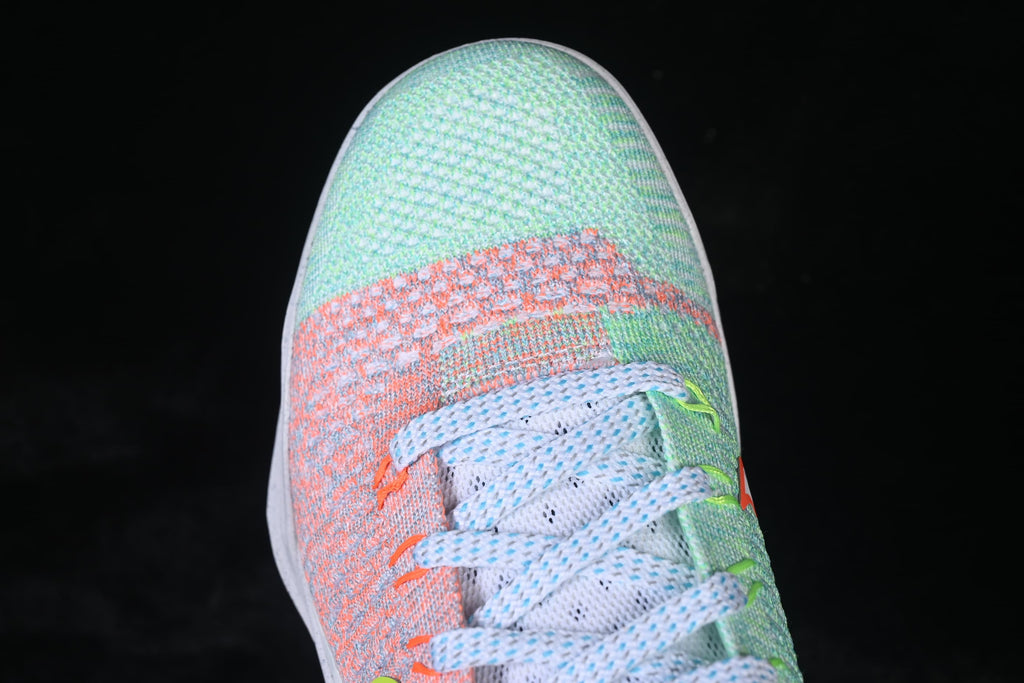 Top close-up of the multicolor toe and lacing area.