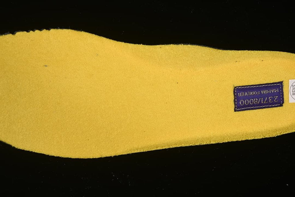 Yellow insole with a visible size marking.