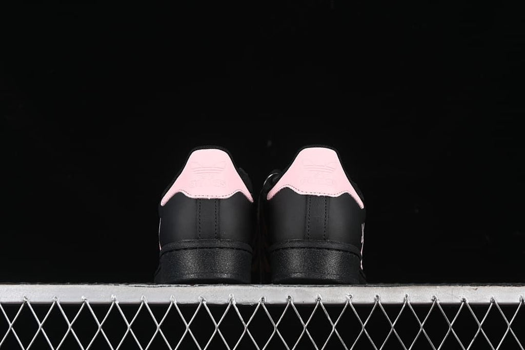 Back view of the pair with pink heel tabs