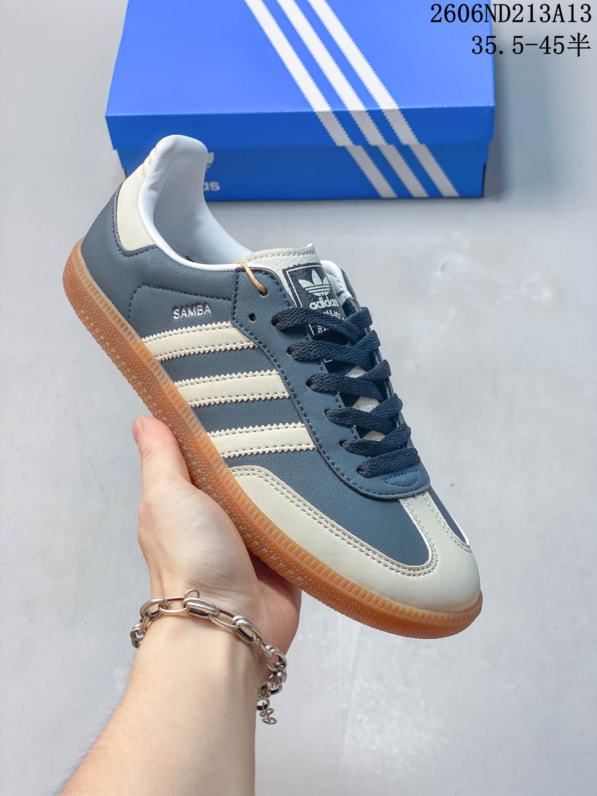 Angled side view of the blue and cream adidas Samba OG sneaker
