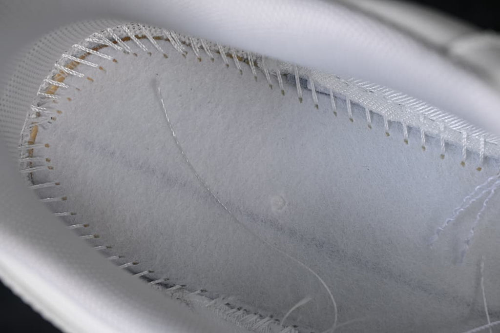Close-up of stitching and lining inside the shoe