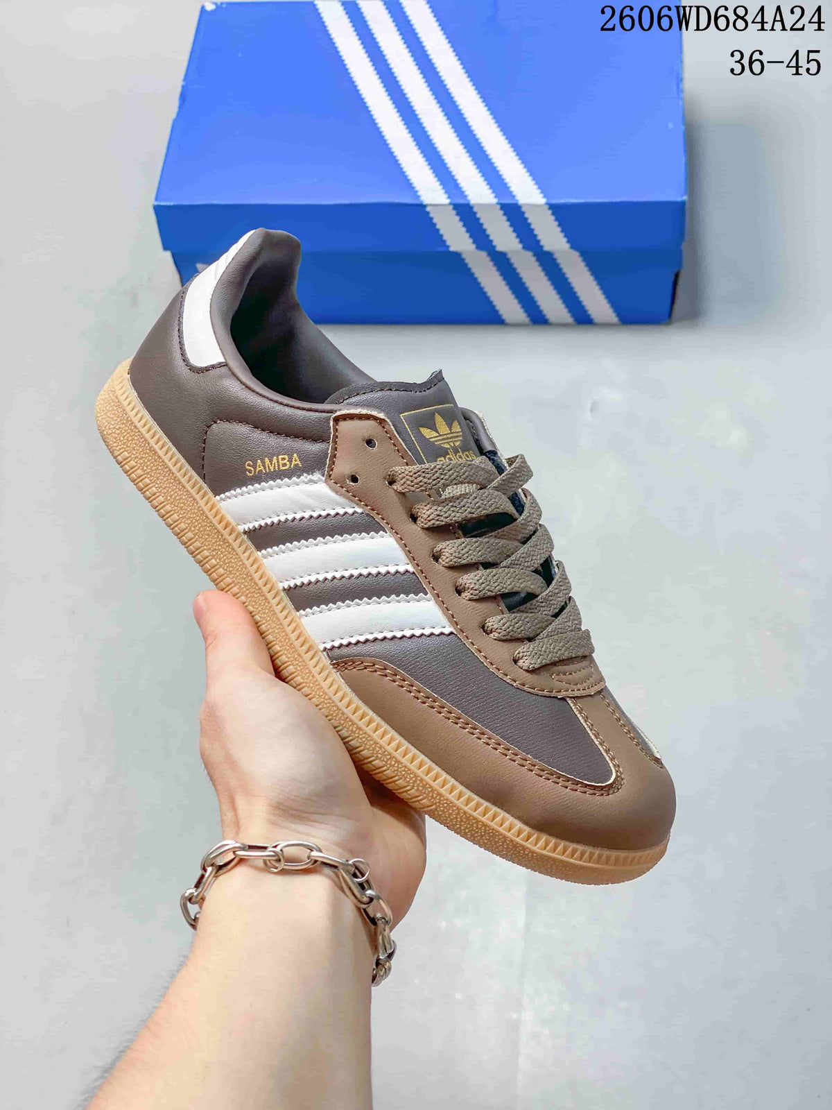 Brown and gray low-top sneaker with white stripes and gum-style sole.